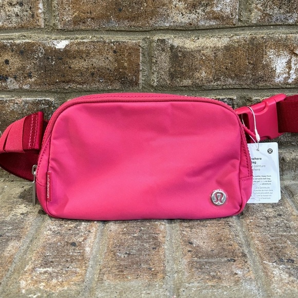 lululemon athletica Handbags - NWT Lululemon Everywhere Belt Bag In Raspberry Coulis